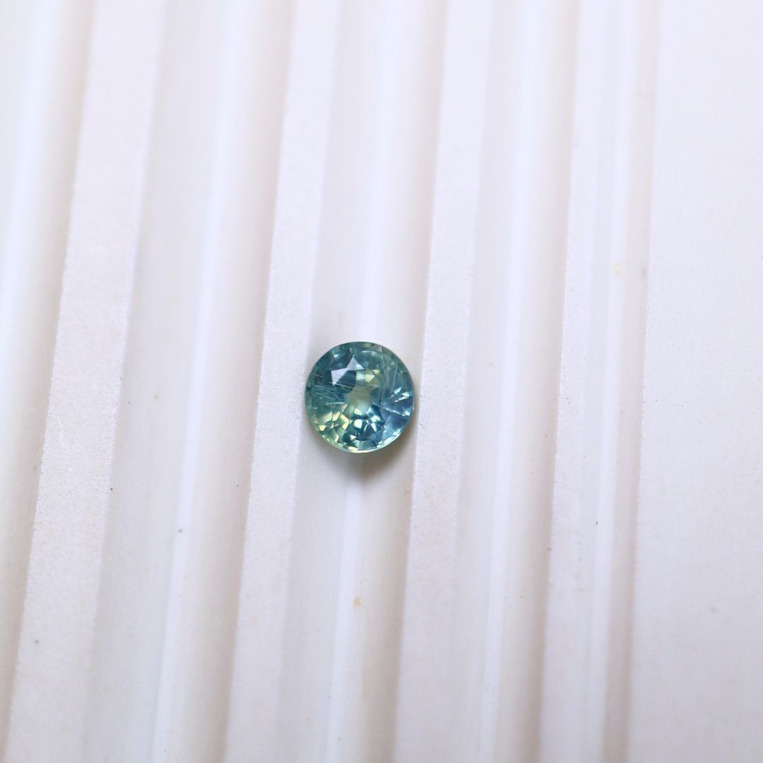 0.53ct Blue Green Round Sapphire