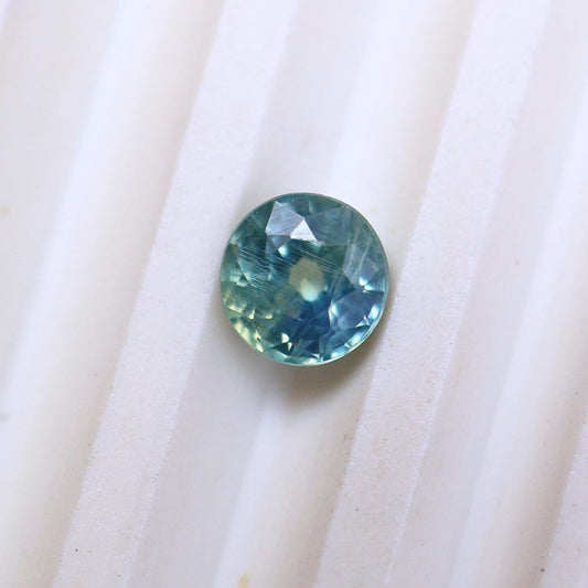 0.53ct Blue Green Round Sapphire